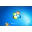 Windows 7 con un osito de peluche y un niño.