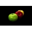 Multicolored apples on a black background