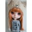 Doll in coat and beret