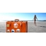 Girl in retro style with suitcases
