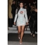 Kardashian yn in chic mini dress