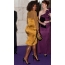 Williams in a yellow dress showed curvaceous