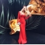 Kotova in a red long dress