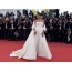 Rihanna in a white lush dress