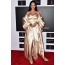 Rihanna yn in swart wyt jurk
