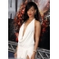 Rihanna in a white dress