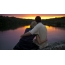 Beautiful sunset, river, couple in love