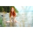 Redhead girl on the river