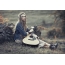 Girl on nature with a guitar