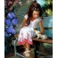 Girl with a kitten on a bench