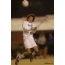 Funny pictures of soccer players kicking the ball