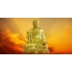 Buddha på solnedgang baggrund