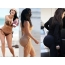 Kardashian embarazada nun traxe de baño