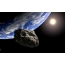 Asteroid on earth background