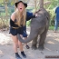 Girl and baby elephant
