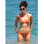 Kate Beckinsale in bikini in a orange