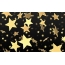 Estrelas douradas em fundo preto
